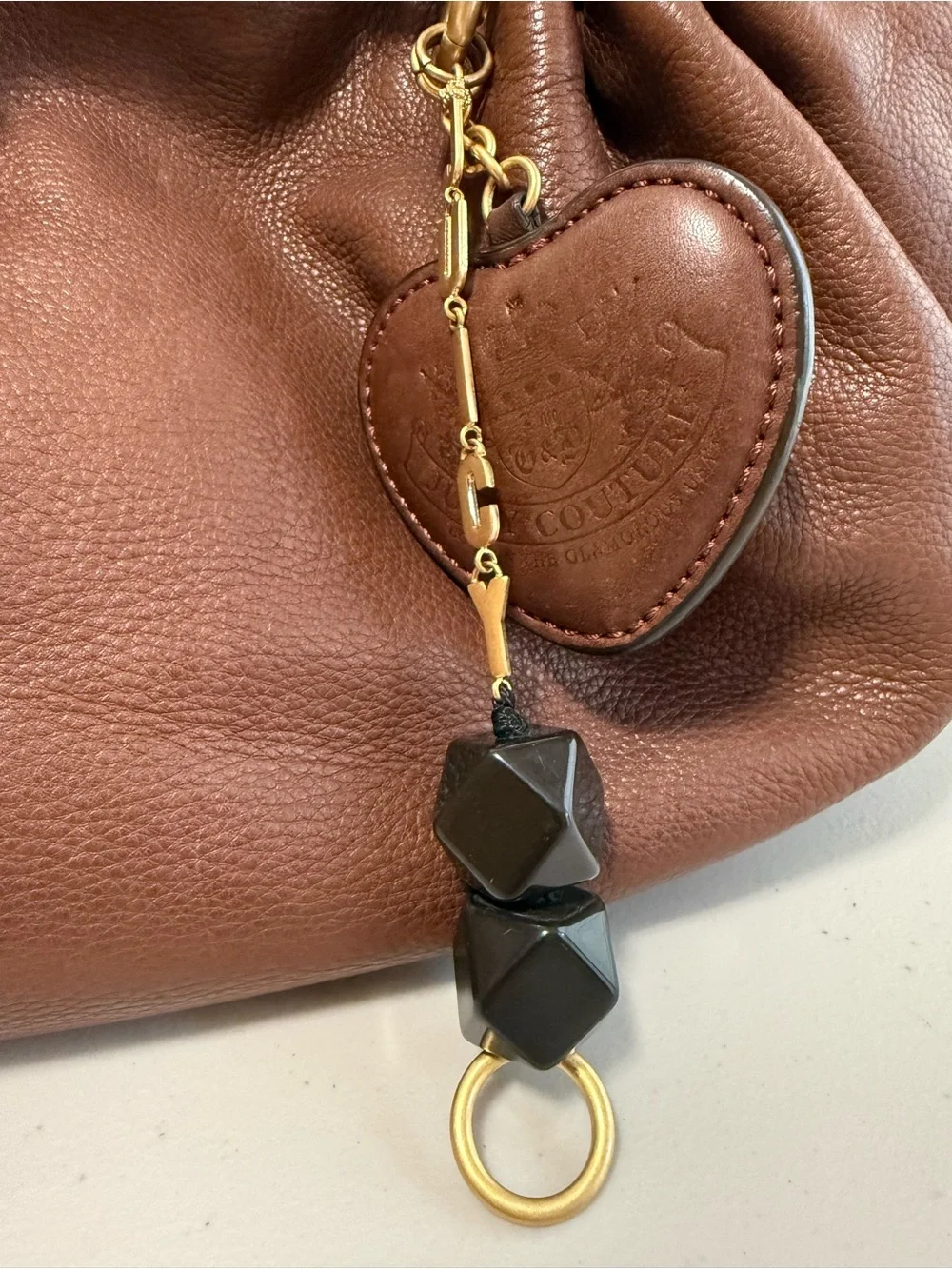 Juicy Couture Brown Leather Shoulder Bag with Gold Chain Accents